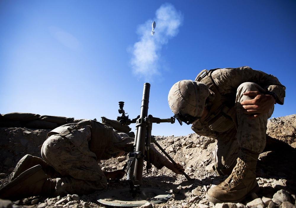 US Marines brace themselves while firing a 60mm mortar round Canvas Art - Stocktrek Images (34 x 24)