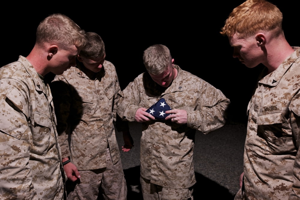 US Marines fold the American Flag Canvas Art - Terry MooreStocktrek Images (18 x 12)