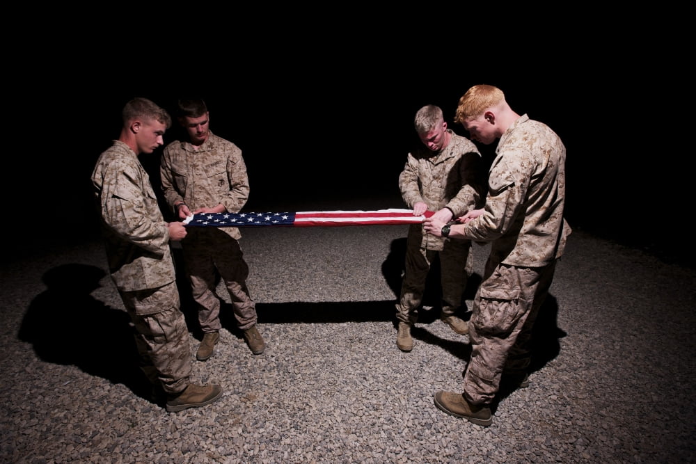 US Marines fold the American Flag Canvas Art - Terry MooreStocktrek Images (18 x 12)