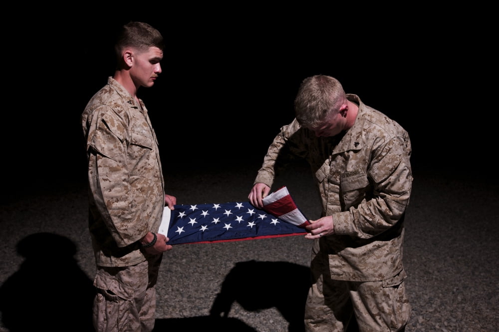 US Marines fold the American Flag Canvas Art - Terry MooreStocktrek Images (35 x 24)