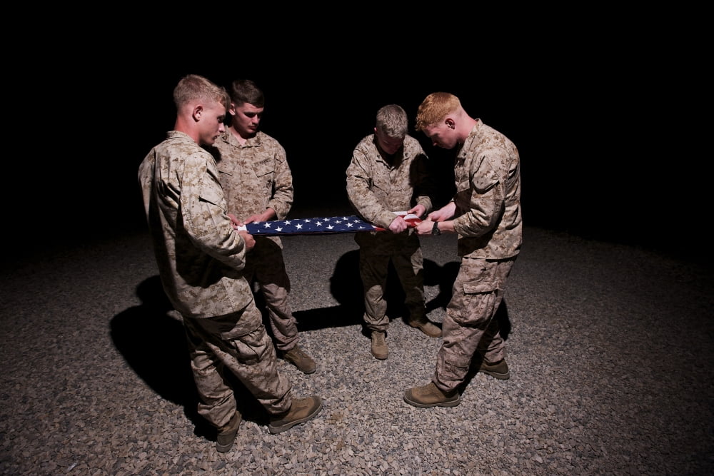 US Marines fold the American Flag Canvas Art - Terry MooreStocktrek Images (35 x 24)