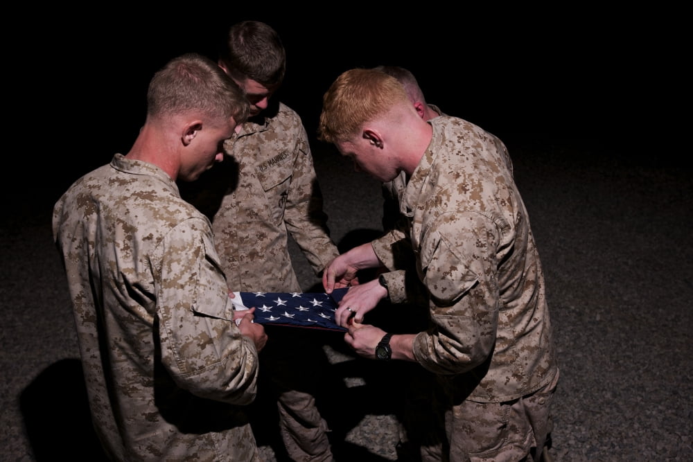 US Marines fold the American Flag Canvas Art - Terry MooreStocktrek Images (35 x 24)