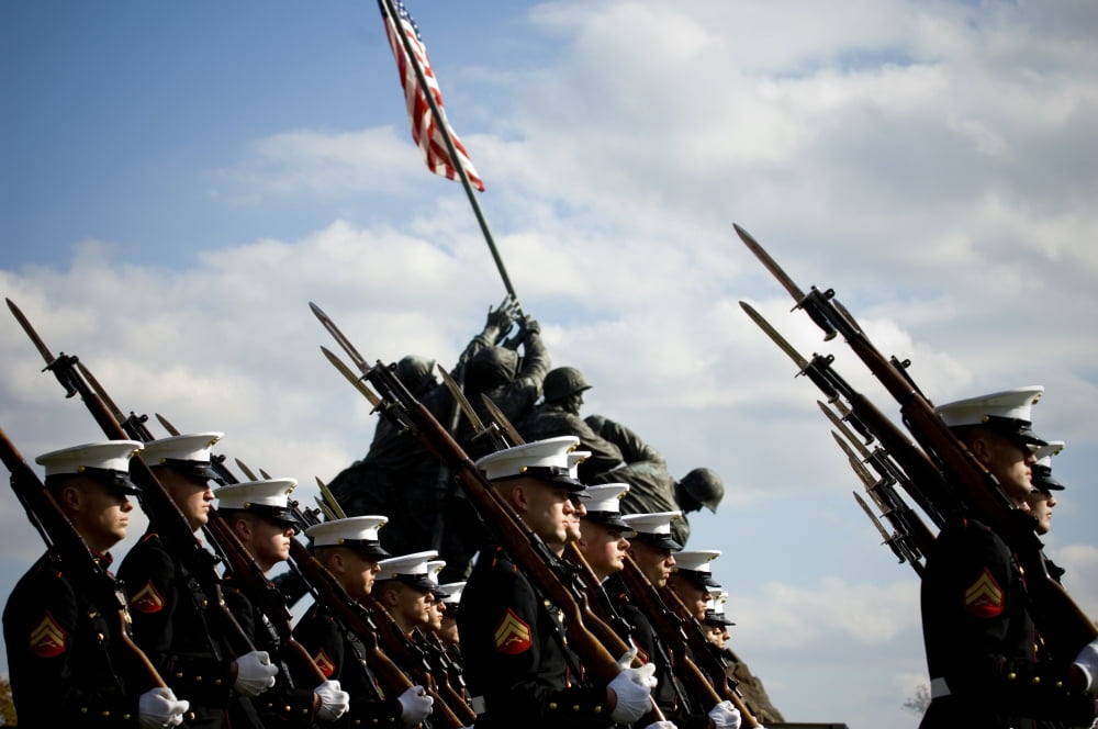 US Marines march past the Marine Corps War Memorial during a wreath laying ceremony Canvas Art - Stocktrek Images (34 x 23)