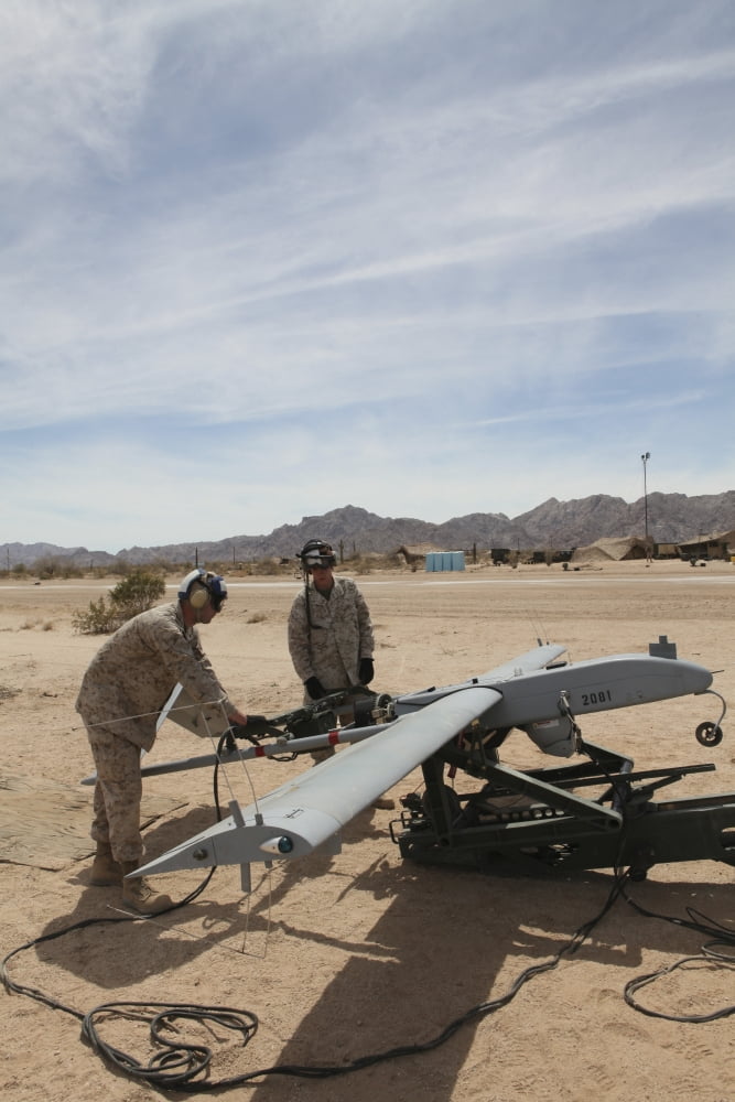 US Marines prepare to start the engine of an RQ-7 Shadow Canvas Art - Stocktrek Images (23 x 35)