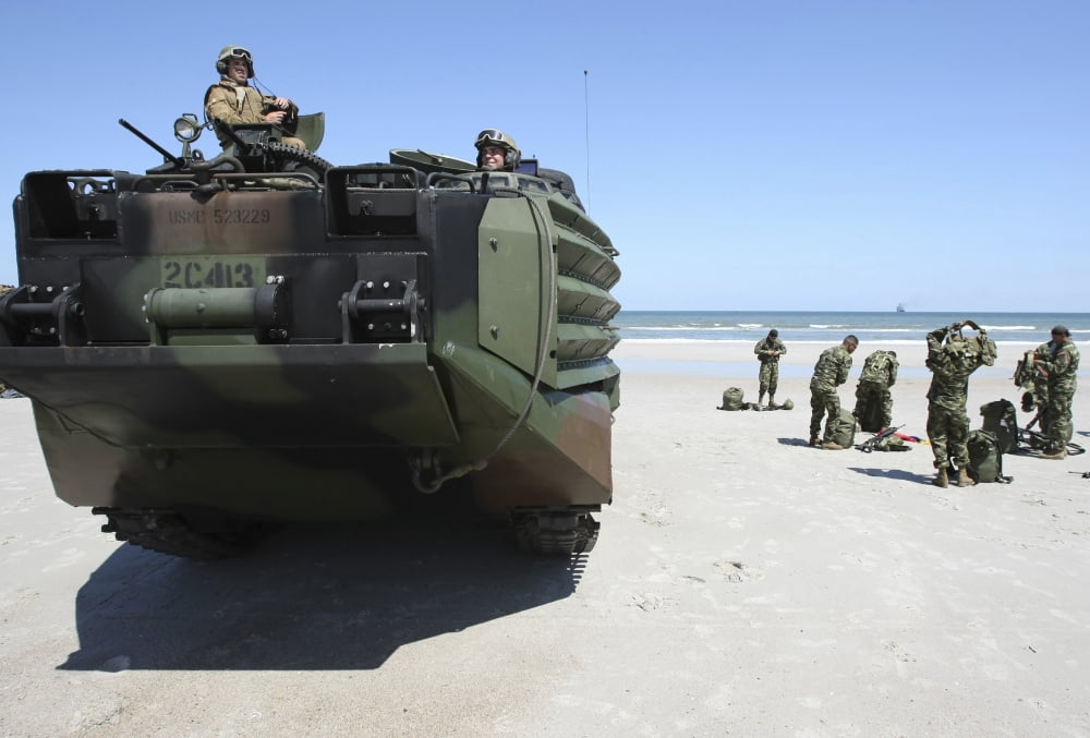 US Marines regroup after assaulting Mayport Beach during a Unitas Gold amphibious assault exercise Canvas Art - Stocktrek Images (34 x 23)