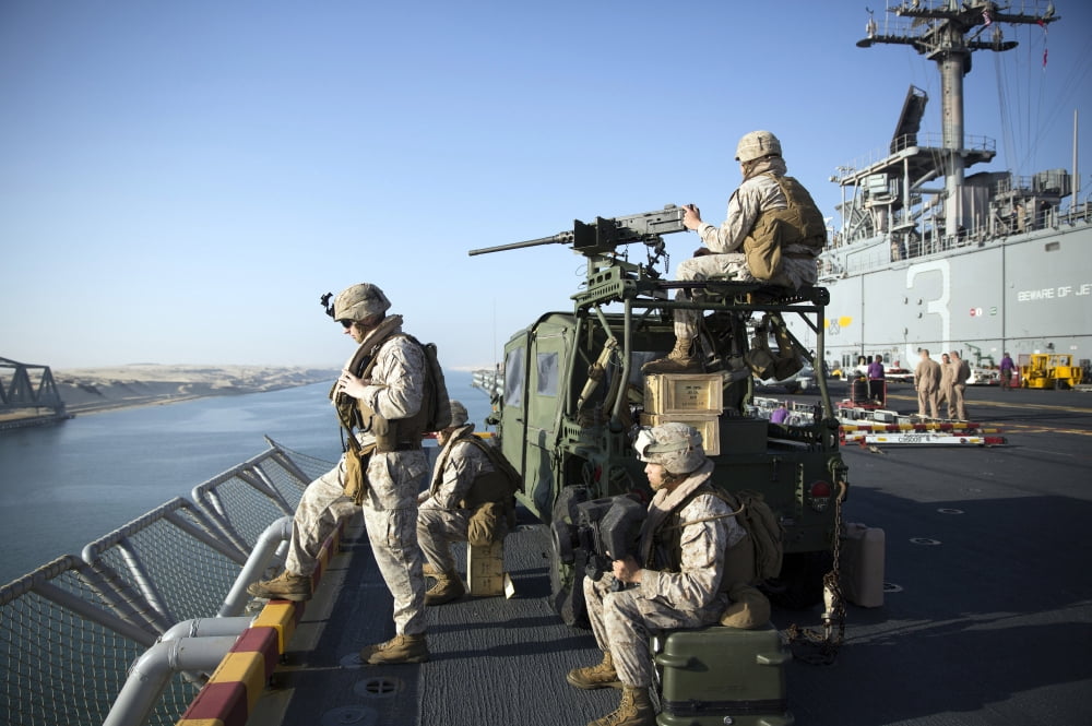 US Marines stand armed watch on the flight deck of USS Kearsarge Canvas Art - Stocktrek Images (35 x 23)