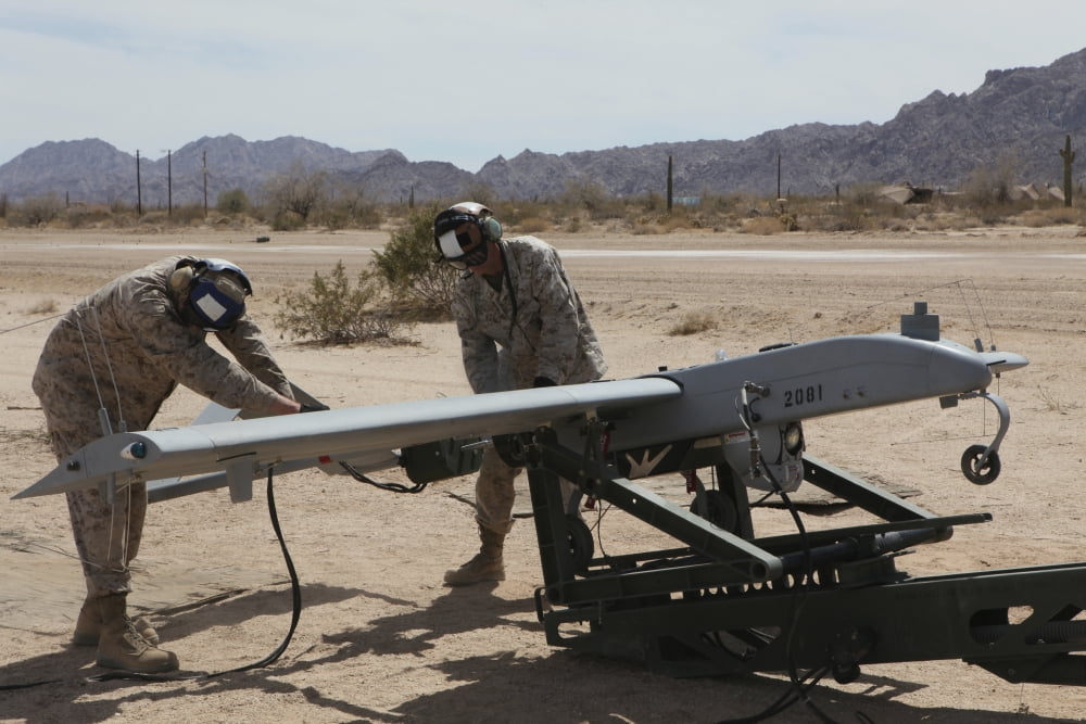 US Marines start the engine of an RQ-7 Shadow Canvas Art - Stocktrek Images (35 x 23)