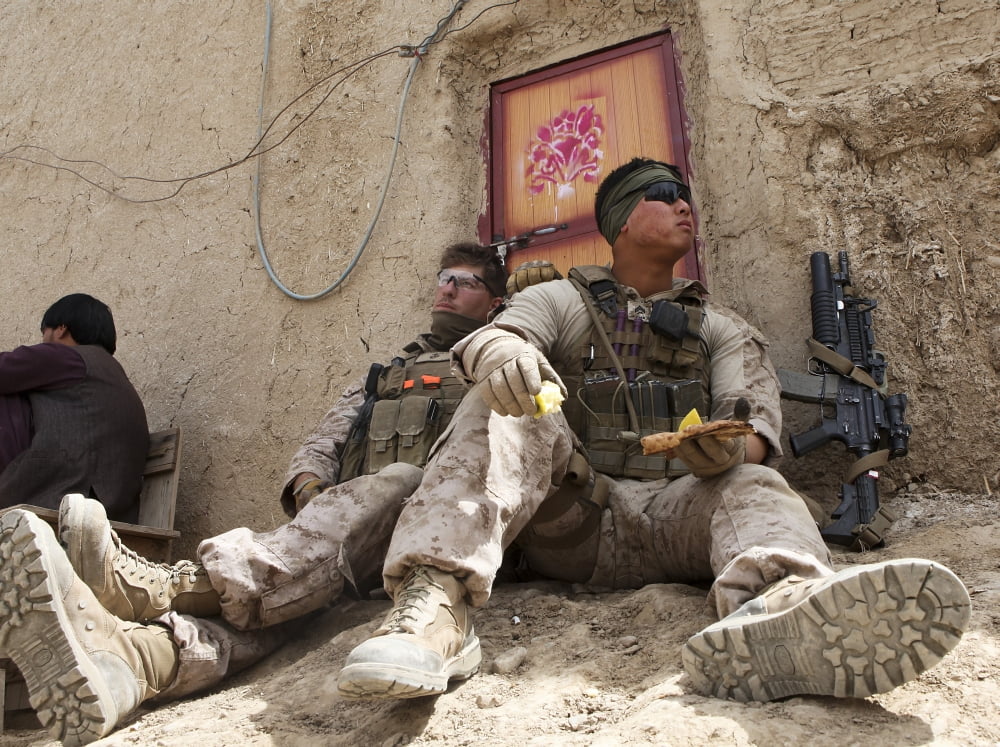 US Marines take a break in the Kajaki district of Afghanistan Canvas Art - Stocktrek Images (33 x 24)