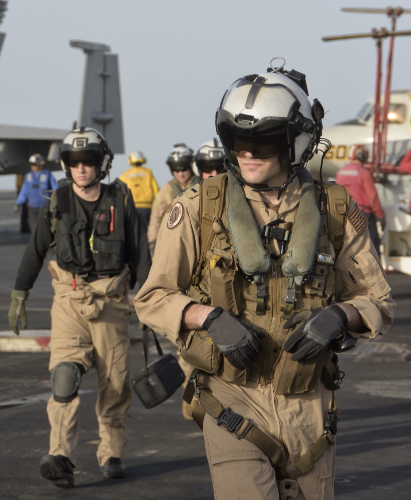 US Navy pilots on the flight deck of USS Theodore Roosevelt Canvas Art - Giovanni CollaStocktrek Images (13 x 16)