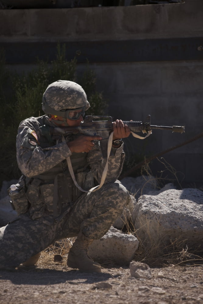 US Soldier conducts a combat training scenario at Playas Training Area New Mexico Canvas Art - Terry MooreStocktrek Images (23 x 35)