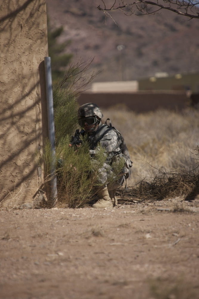US Soldier conducts a combat training scenario at Playas Training Area New Mexico Canvas Art - Terry MooreStocktrek Images (23 x 35)