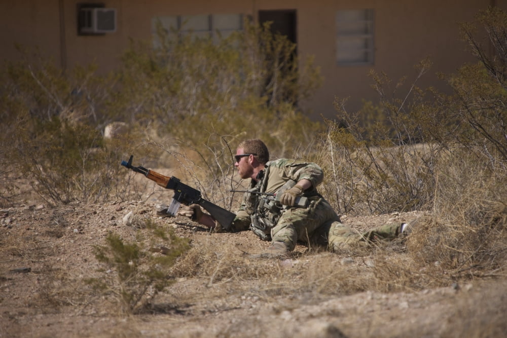 US Soldier conducts a combat training scenario at Playas Training Area New Mexico Canvas Art - Terry MooreStocktrek Images (35 x 23)