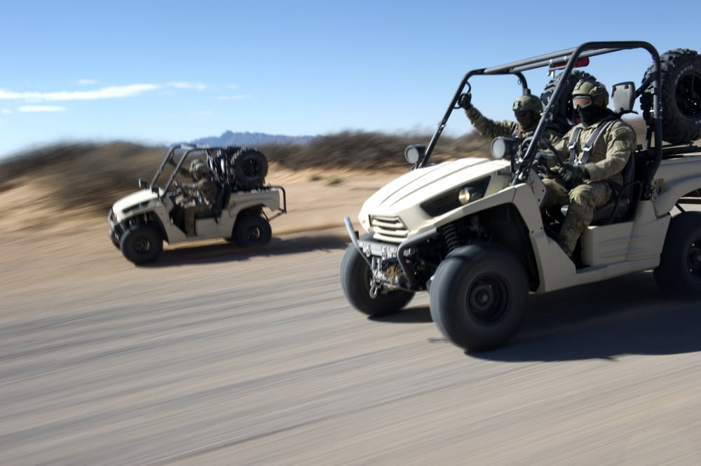 US Soldiers drive multiple LTATVs down a dirt road Canvas Art - Stocktrek Images (34 x 23)