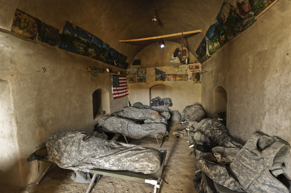 US Soldiers sleep in an abandoned mud house during Operation Helmand Spider Canvas Art - Stocktrek Images (34 x 23)