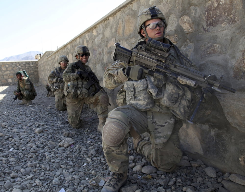 US Soldiers wait for the order to move against enemy positions in Charkh Afghanistan Canvas Art - Stocktrek Images (32 x 25)