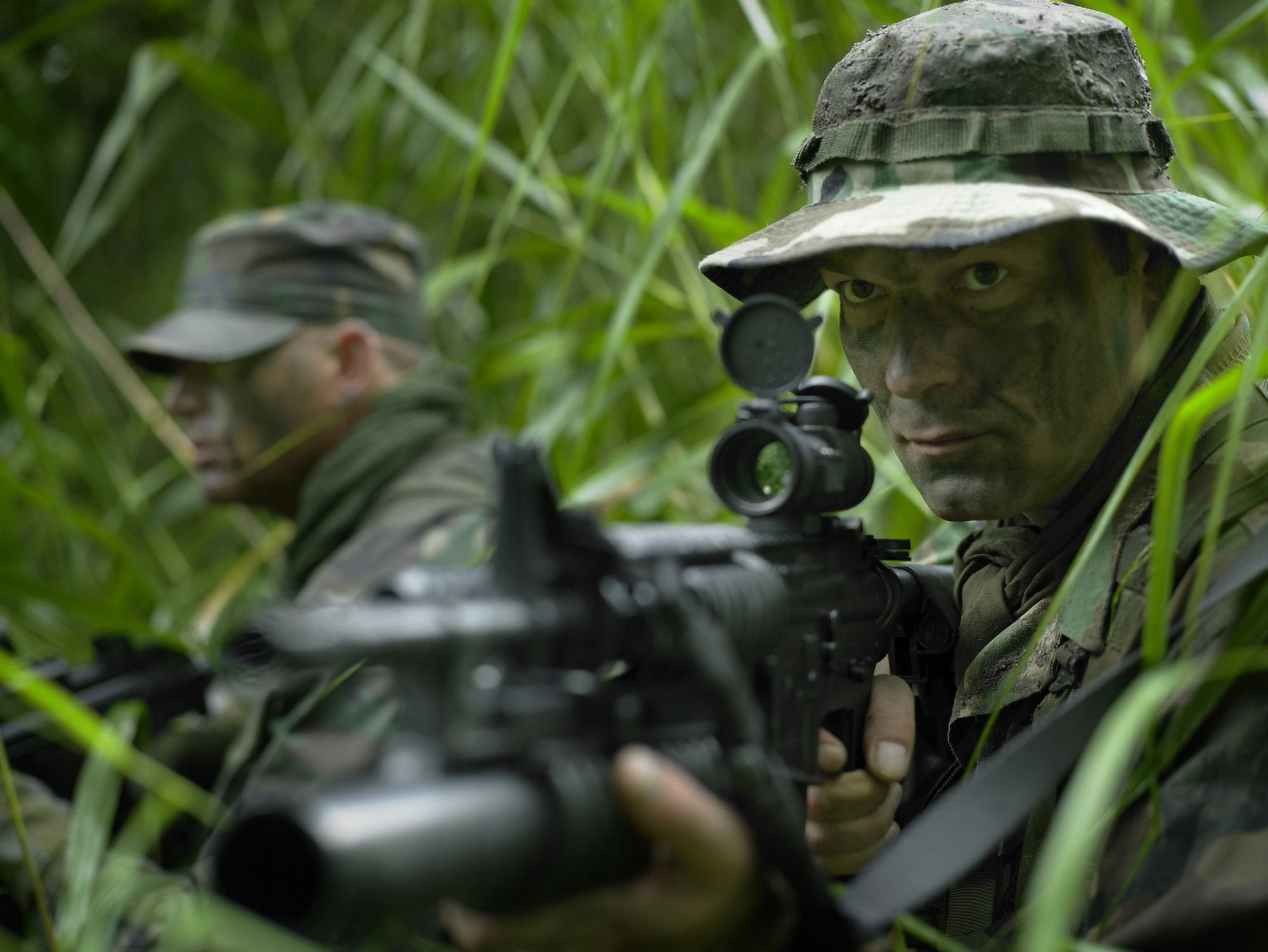 US Special Forces soldiers patrol through tall grass during combat Canvas Art - Tom WeberStocktrek Images (33 x 25)