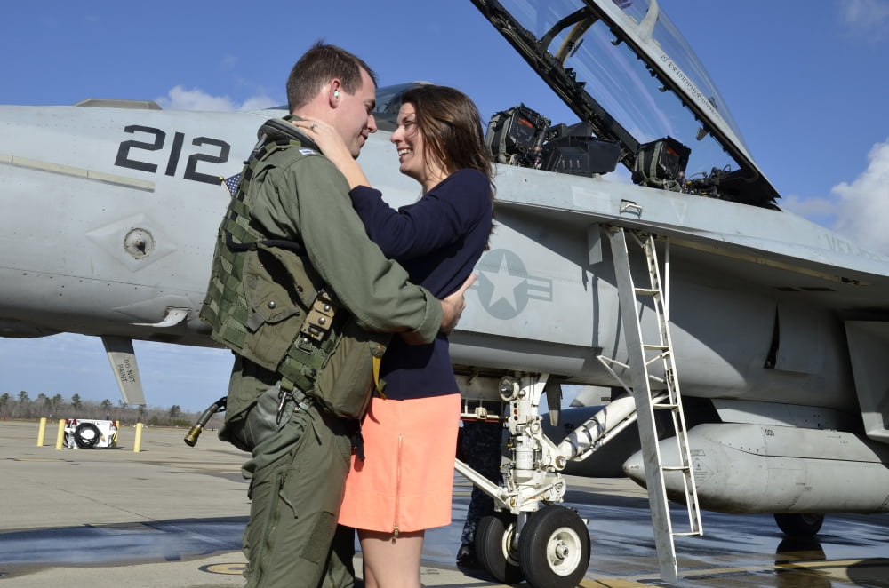 US aviator is reunited with his wife during a homecoming celebration Canvas Art - Stocktrek Images (35 x 23)