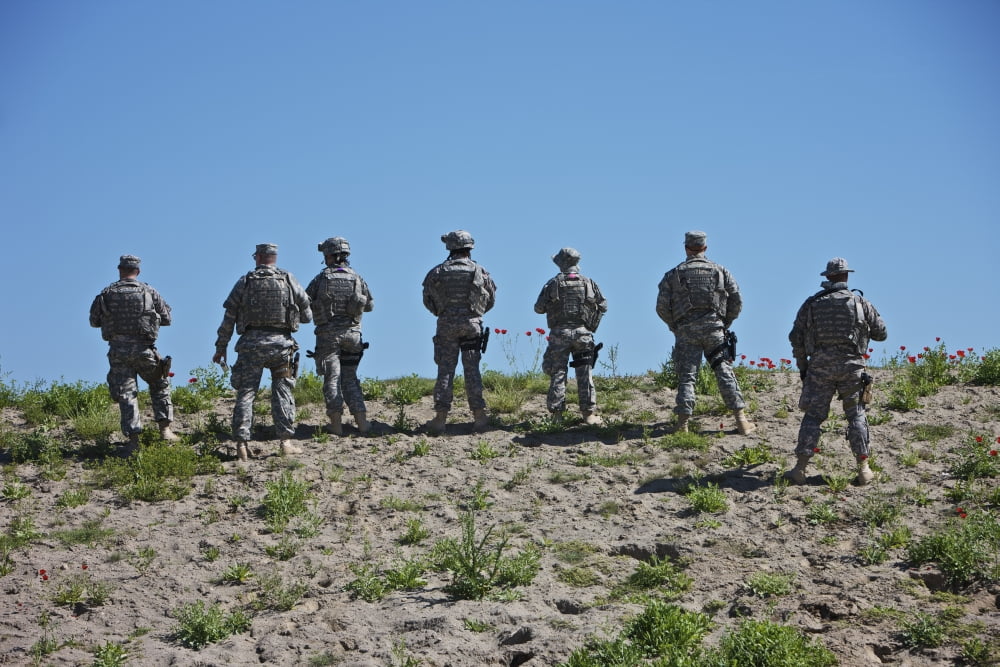 US soldiers looking over the side of the Konduz RTC Range Afghanistan Canvas Art - Terry MooreStocktrek Images (18 x 12)