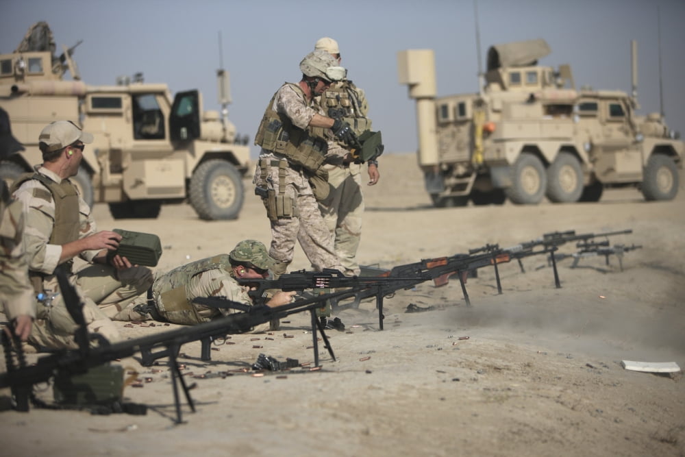 US soldiers prepare to fire weapons on a firing range in Afghanistan Canvas Art - Terry MooreStocktrek Images (18 x 12)