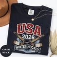 thumbnail image 1 of USA 2026 Winter Hockey T-Shirt, Retro Varsity Ice Hockey Graphic Design, Patriotic American Sports Fan Apparel, Comfort Colors Unisex Cotton T-Shirt, Size S-3XL, 1 of 3