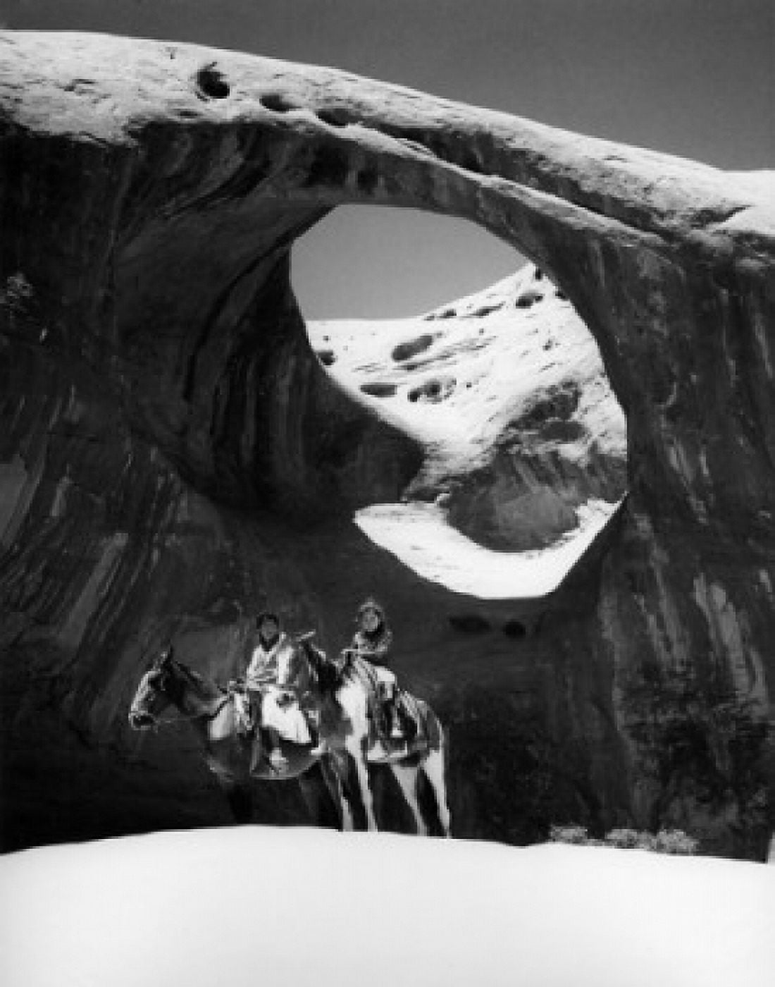 USA Arizona Monument Valley man and child riding horses by rock formation Canvas Art -  (18 x 24)