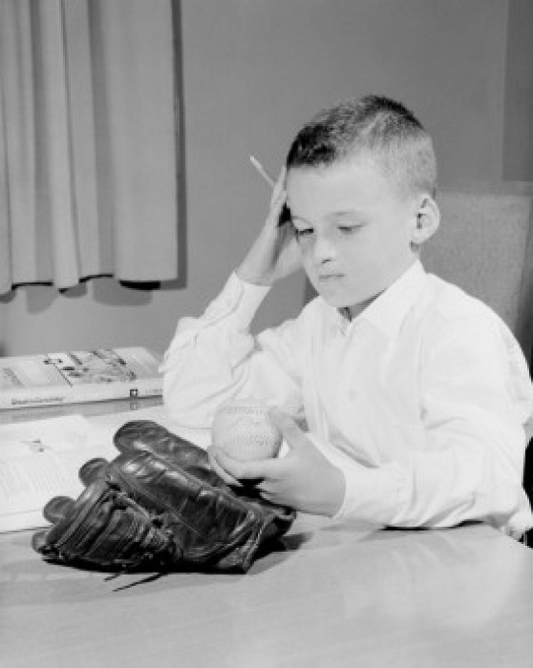 USA Boy with baseball and glove doing homework Canvas Art - (24 x 36)