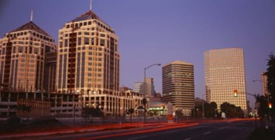 USA California Oakland Alameda County New City Center Buildings lit up at night Canvas Art - Panoramic Images (24 x 12)