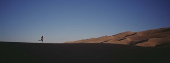 USA Colorado Great Sand Dunes National Monument Runner jogging in the park Canvas Art - Panoramic Images (36 x 13)