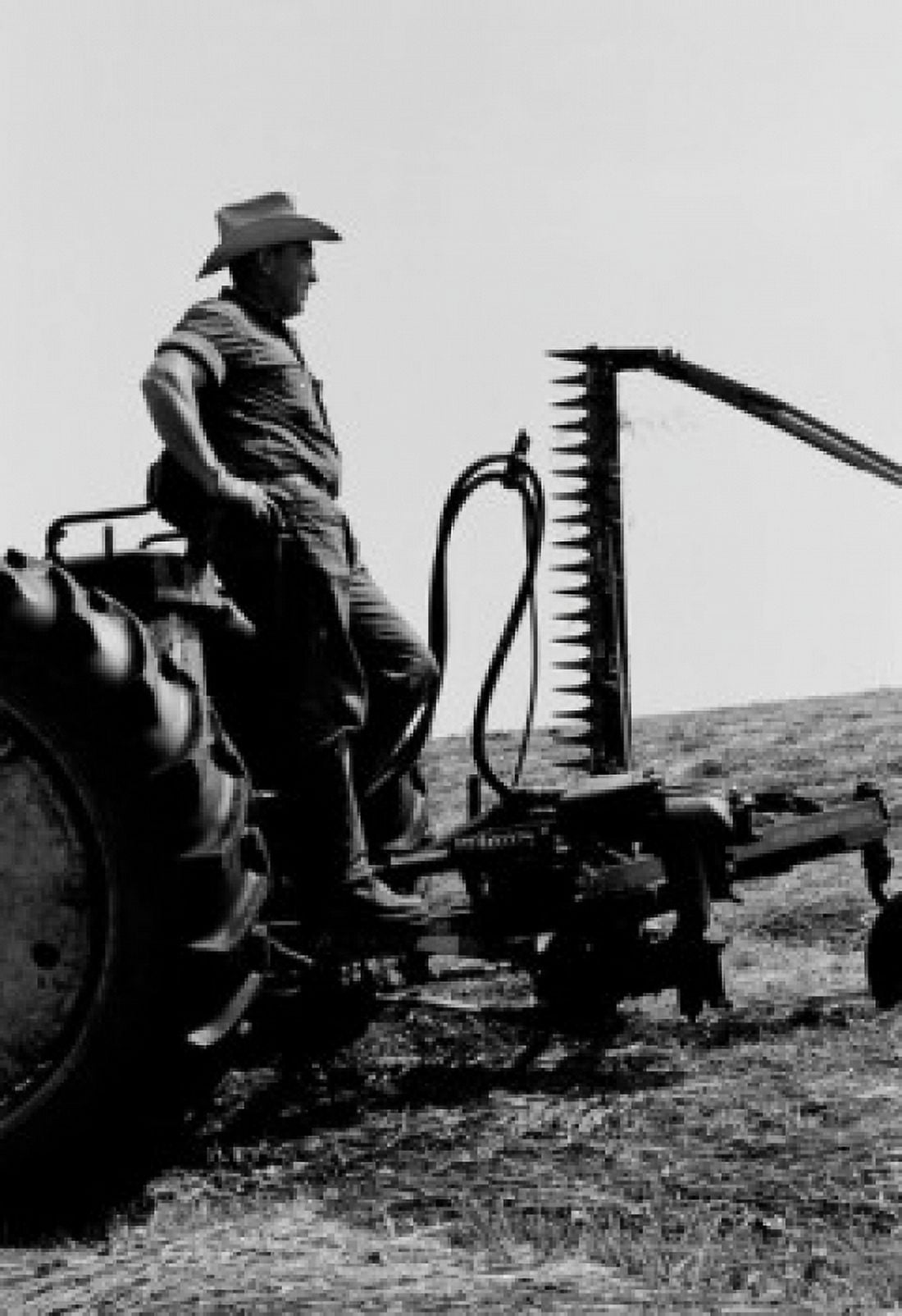 USA Farmer standing on tractor and looking away Canvas Art - (24 x 36)