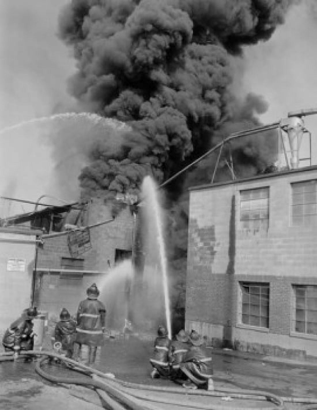 USA Fireman fighting blaze in burning building Canvas Art - (18 x 24)