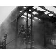 thumbnail image 1 of USA, Fireman fighting blaze in burning building Poster Print (18 x 24), 1 of 1