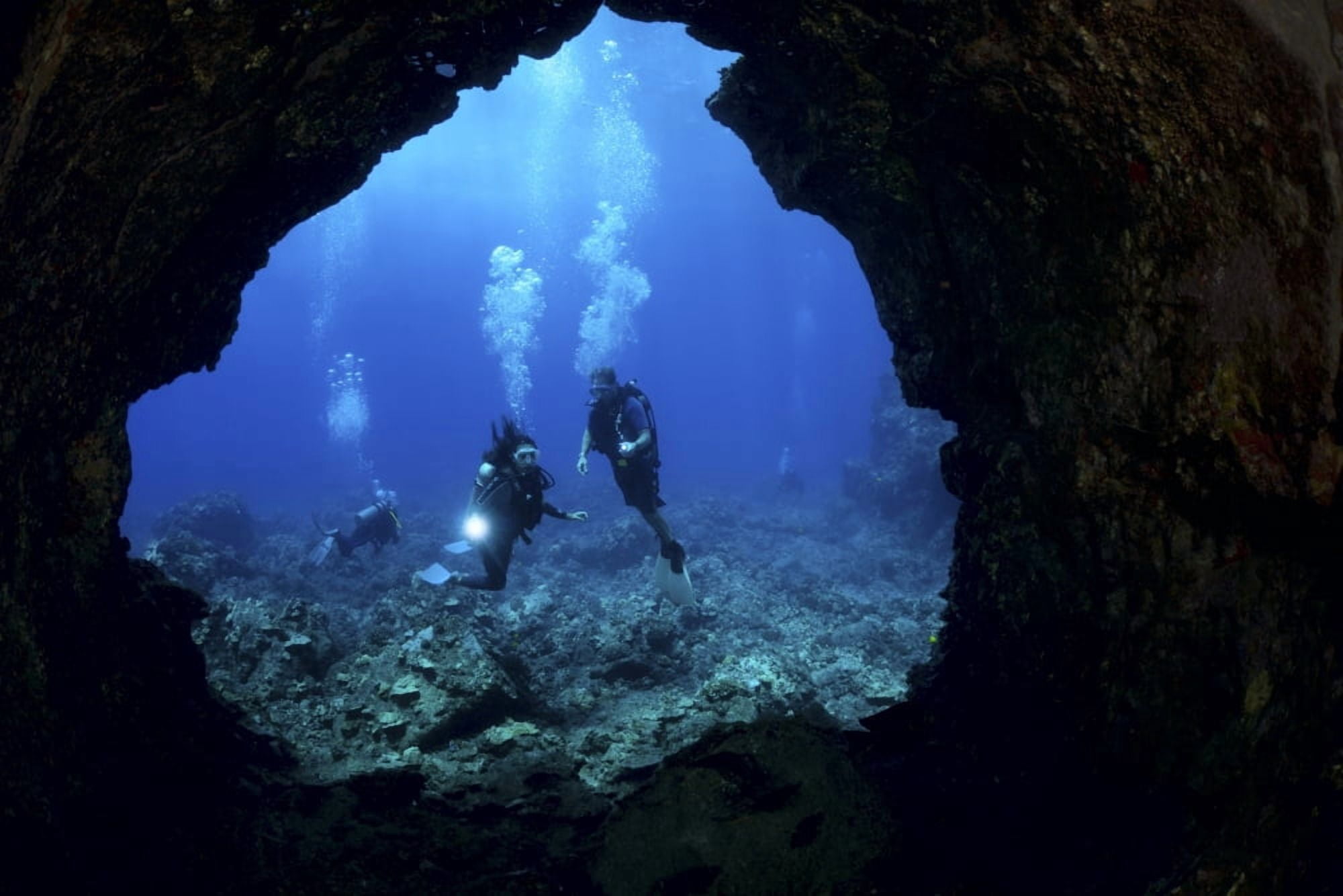 USA Hawaii Islands Divers At Entrance To Lava Tube Lanai Canvas Art - Dave Fleetham Design Pics (18 x 12)