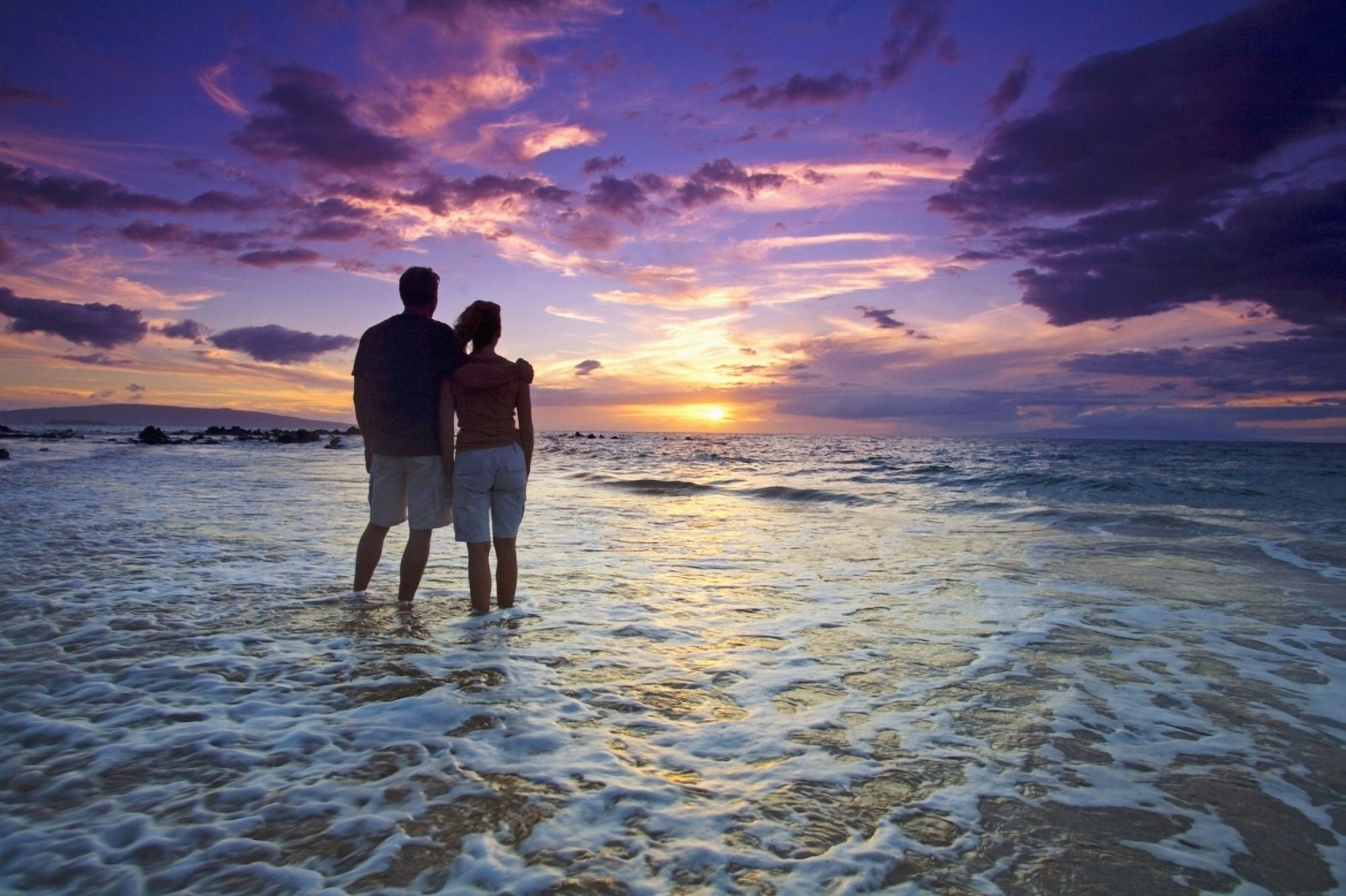 USA Hawaii Islands Maui Mokapu Beach Wailea Couple Watching Sunset While Wading In Ocean Canvas Art - Ron Dahlquist Design Pics (17 x 11)