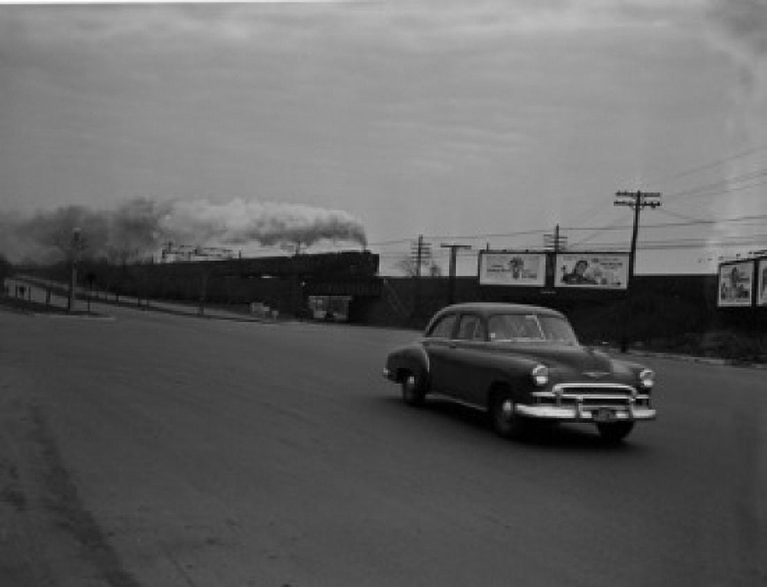 USA Massachusetts Boston Car on road steam train in the background Canvas Art - (18 x 24)