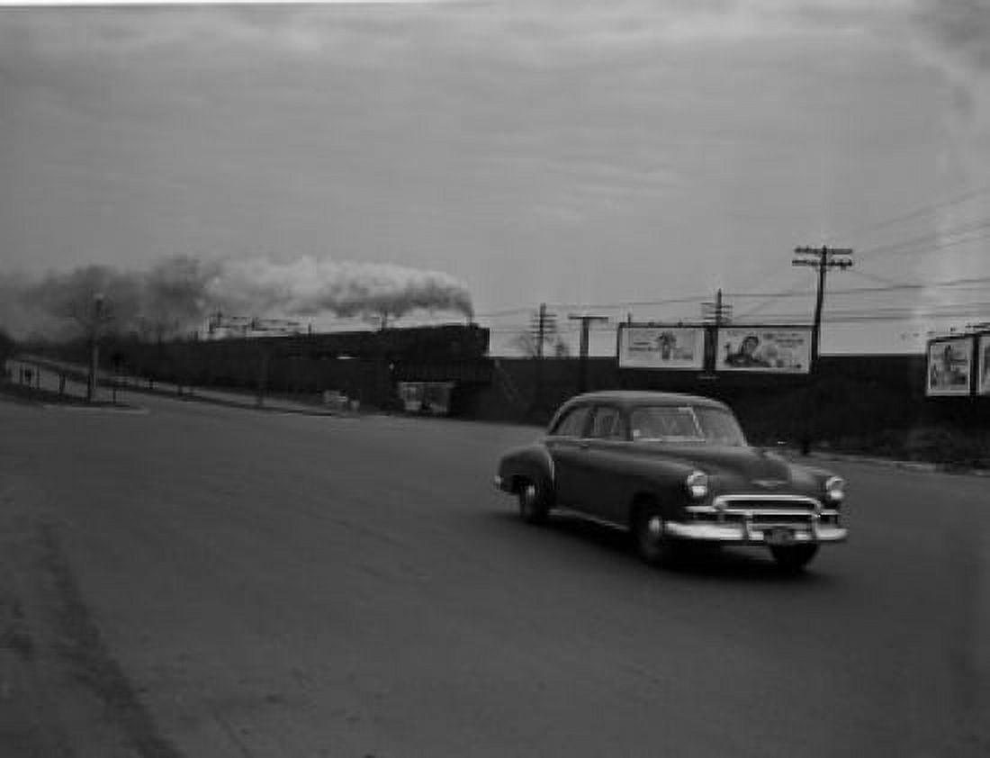 USA Massachusetts Boston Car on road steam train in the background Canvas Art - (24 x 36)