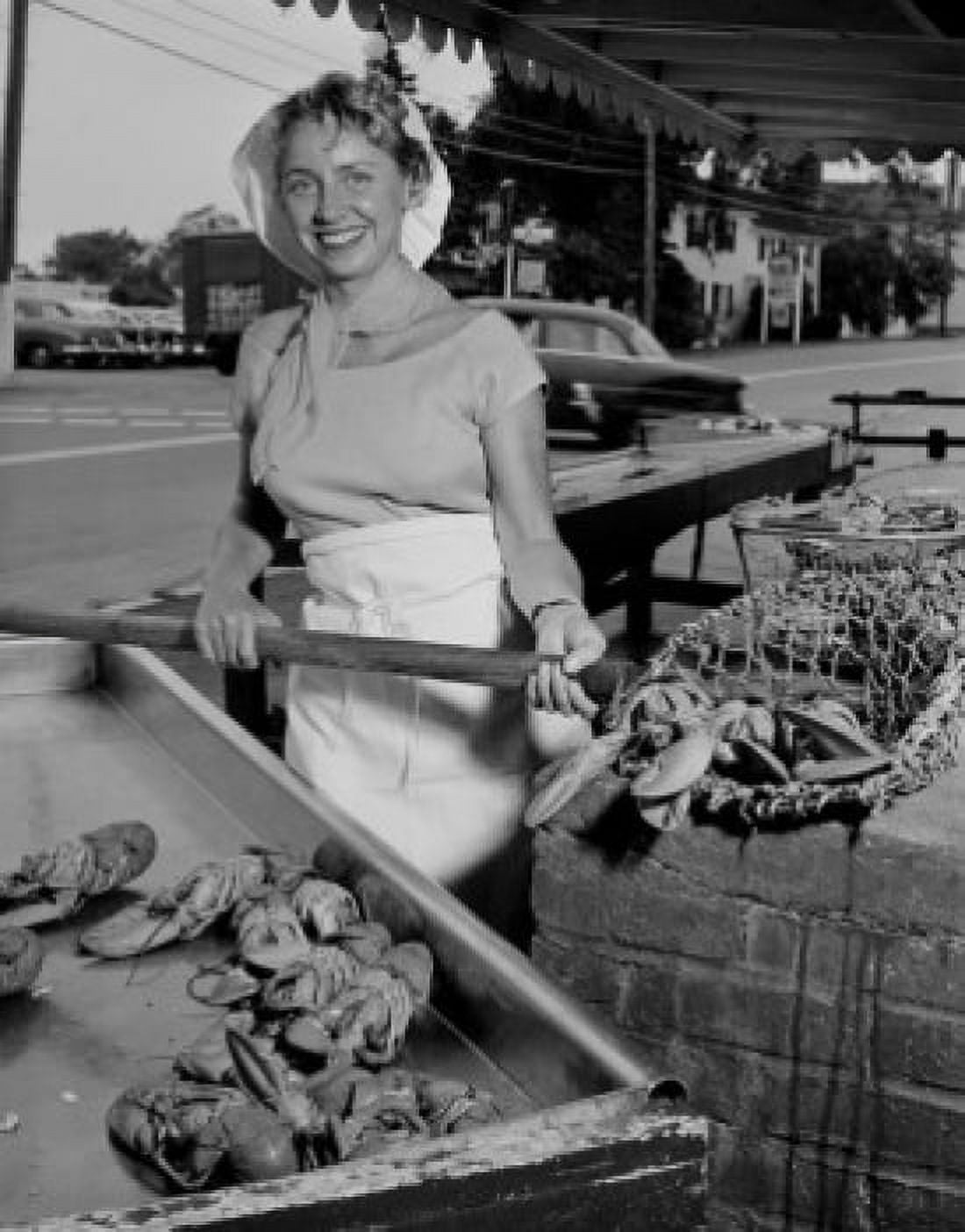 USA Massachusetts Essex Female fishmonger selling Lobsters Canvas Art - (24 x 36)