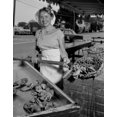 thumbnail image 1 of USA, Massachusetts, Essex, Female fishmonger selling Lobsters Poster Print (24 x 36), 1 of 1