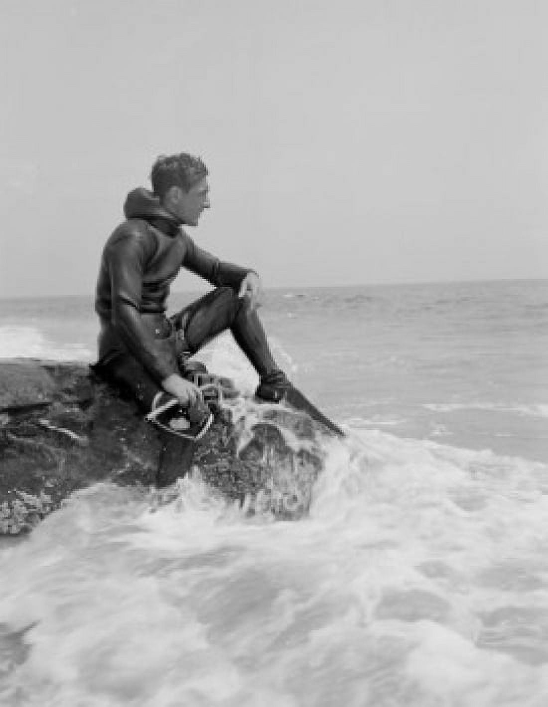 USA Massachusetts Horseneck Beach State Reservation scuba diver sitting on rock Canvas Art -  (18 x 24)
