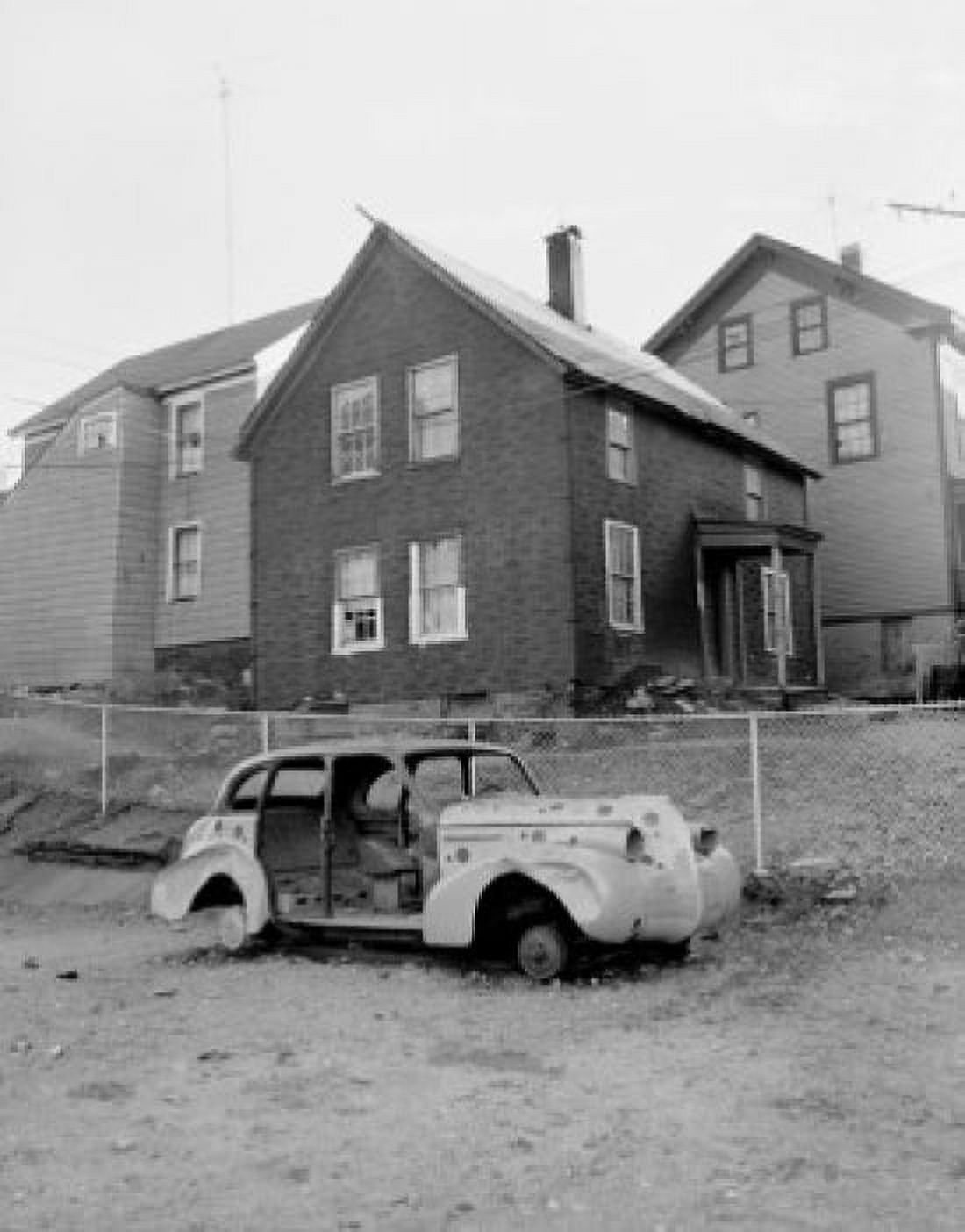 USA Massachusetts Worcester Car wreck with houses in background Canvas Art - (18 x 24)