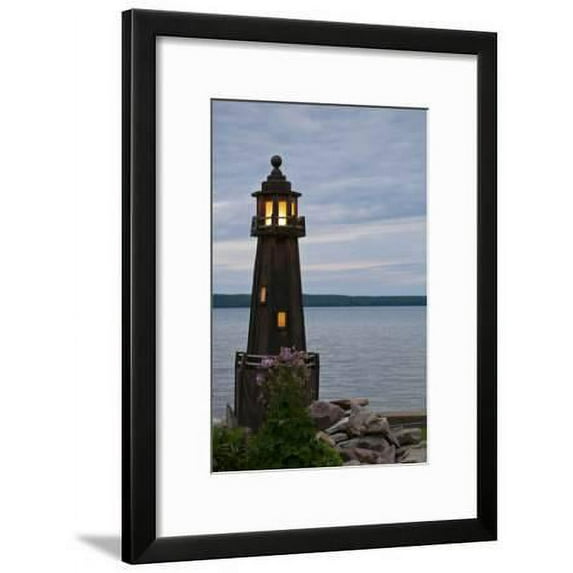 USA, Michigan Yard decoration lighthouse on Munising Bay, Framed Art Print Wall Art by Anna Miller Sold by Art.Com