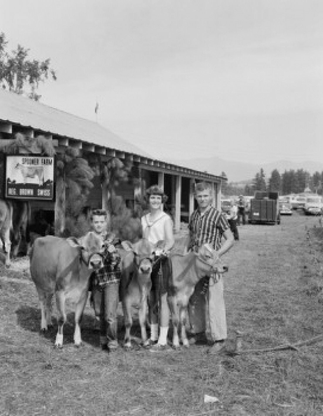 USA New Hampshire Lancaster Portrait of parents with son and cow at county fair Canvas Art - (24 x 36)