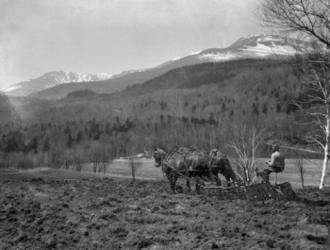 USA New Hampshire Pinkham Notch Spring harrowing on farm in The Glen Mount Washington in background Canvas Art - (18 x 24)