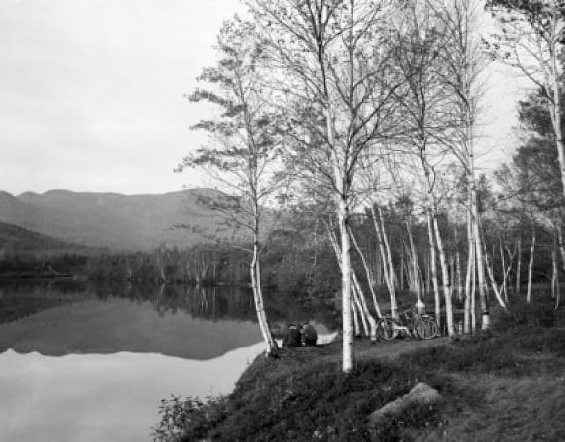 USA New Hampshire Shelburne Cyclists resting on banks of Androscoggin River Canvas Art - (24 x 36)