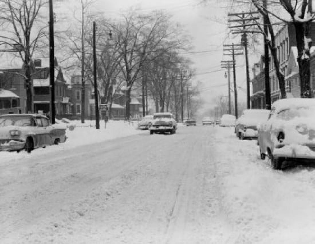 USA New York Binghamton Street covering by snow with cars passing Canvas Art - (24 x 36)