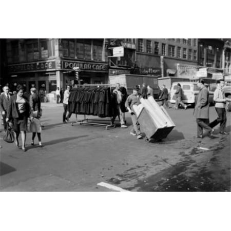 USA New York City Garment Carrier Crossing 8th Avenue at 38th Street Poster Print
