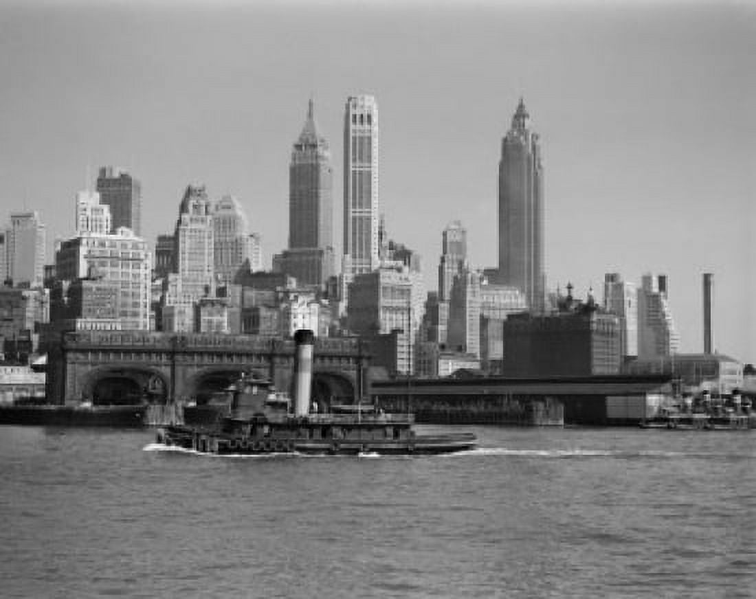 USA New York City Lower Manhattan skyline with tugboat in foreground Canvas Art - (24 x 36)