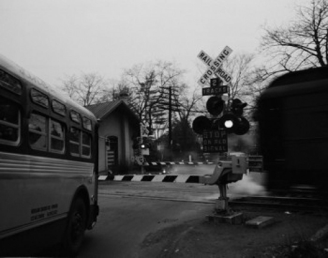 USA New York City Staten Island West Shore Bus waiting at rail crossing Canvas Art -  (24 x 36)