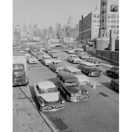 USA New York City Traffic with Manhattan Skyline Poster Print - 18 x 24 in.