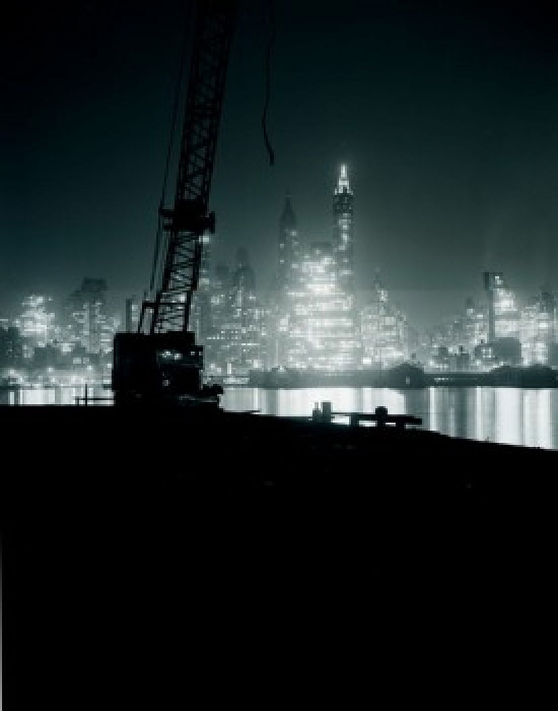 USA New York Manhattan skyline at night with silhouette of crane Canvas Art - (18 x 24)