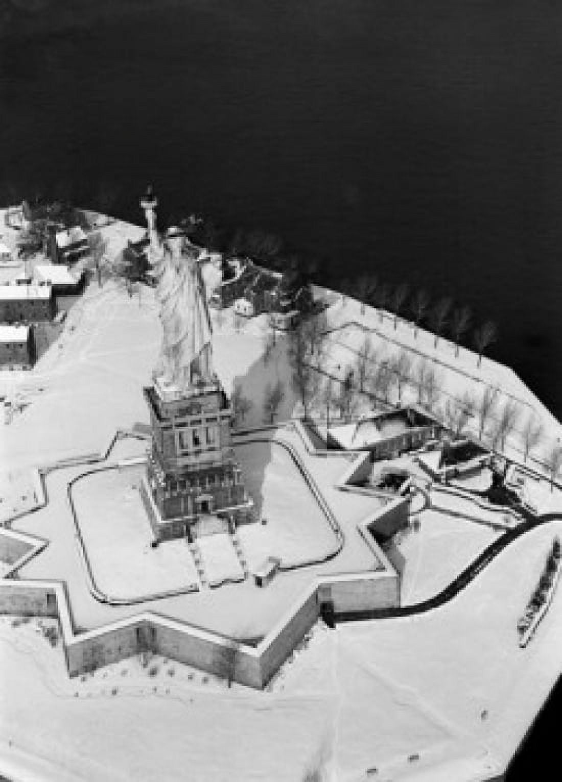 USA New York New York City Aerial view of Liberty Island with Statue of Liberty in Winter Canvas Art - (18 x 24)